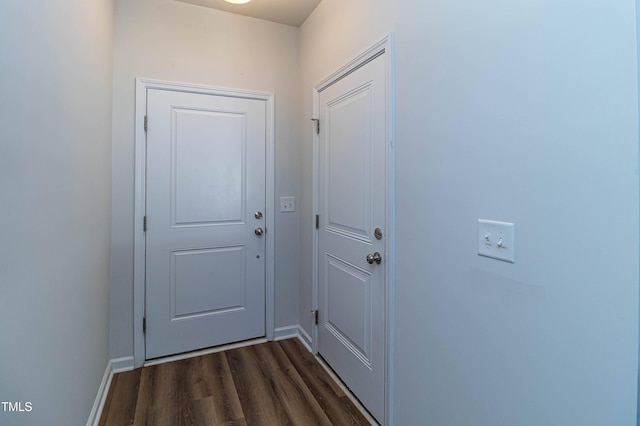 121 Longleaf Pine St, Clayton, NC 27527 - doorway with dark wood finished floors and baseboards