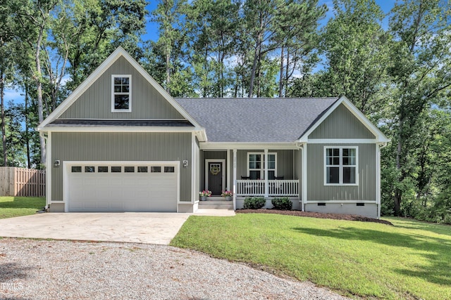3909 Bristlewood Dr, Durham, NC 27703 - view of front of property featuring covered porch, concrete driveway, crawl space, a shingled roof, and an attached garage