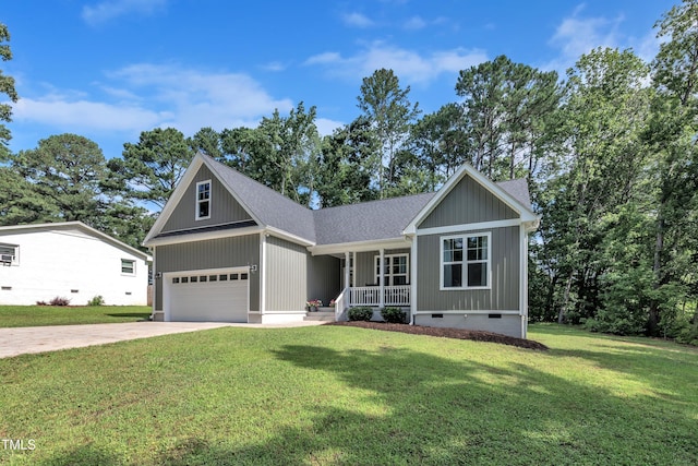 3909 Bristlewood Dr, Durham, NC 27703 - view of front of home featuring covered porch, crawl space, driveway, a front yard, and roof with shingles