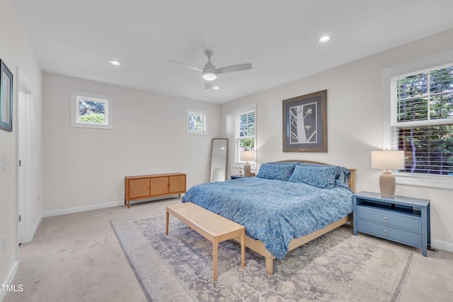 3909 Bristlewood Dr, Durham, NC 27703 - carpeted bedroom featuring multiple windows, recessed lighting, and a ceiling fan