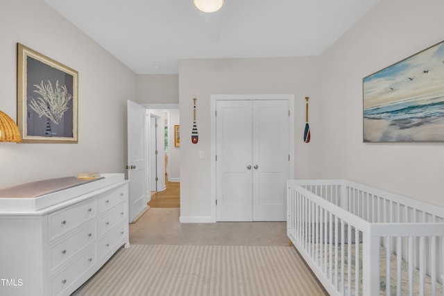 3909 Bristlewood Dr, Durham, NC 27703 - bedroom featuring a closet and light carpet