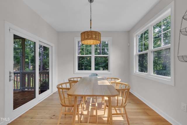 3909 Bristlewood Dr, Durham, NC 27703 - dining space with light wood-style floors