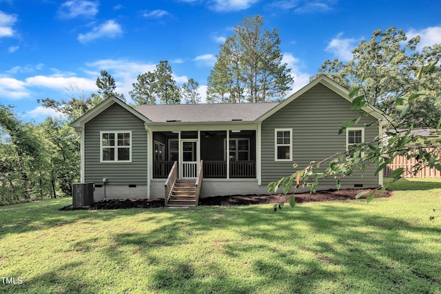3909 Bristlewood Dr, Durham, NC 27703 - rear view of house featuring crawl space, a sunroom, a lawn, and roof with shingles