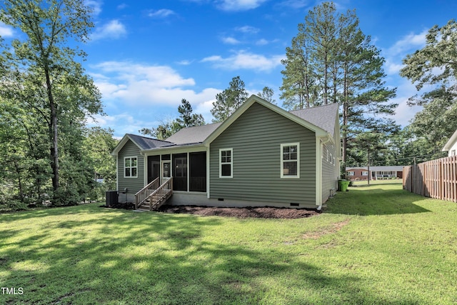 3909 Bristlewood Dr, Durham, NC 27703 - rear view of house featuring crawl space, a sunroom, and a shingled roof
