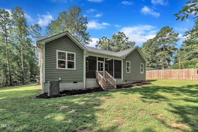3909 Bristlewood Dr, Durham, NC 27703 - back of property featuring crawl space, a sunroom, and a shingled roof