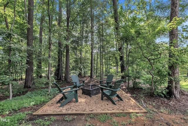 3909 Bristlewood Dr, Durham, NC 27703 - view of yard featuring an outdoor fire pit