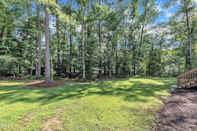 3909 Bristlewood Dr, Durham, NC 27703 - view of grassy yard featuring stairway