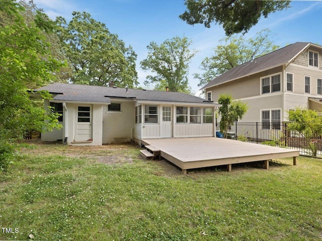 1521 N Duke St, Durham, NC 27701 - back of property with a deck, a chimney, a sunroom, and brick siding