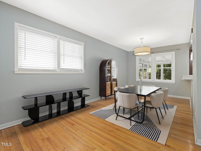 1521 N Duke St, Durham, NC 27701 - dining space with light wood-style flooring and baseboards