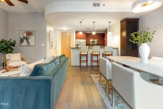 618 N Boylan Ave Unit 520, Raleigh, NC 27603 - living room featuring ceiling fan and hardwood / wood-style flooring