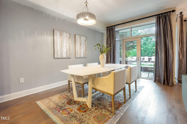 618 N Boylan Ave Unit 520, Raleigh, NC 27603 - dining room with hardwood / wood-style flooring and a chandelier