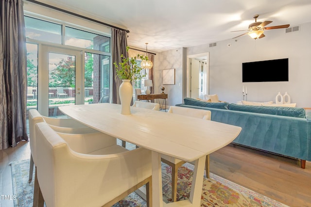 618 N Boylan Ave Unit 520, Raleigh, NC 27603 - dining area featuring wood finished floors and a ceiling fan