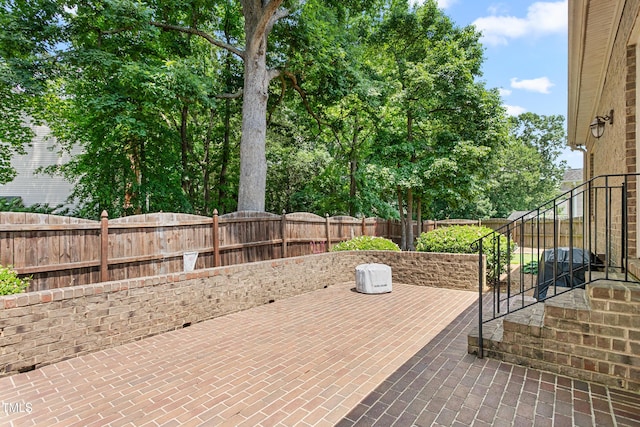 412 Whitt Ave, Burlington, NC 27215 - fenced backyard with a patio