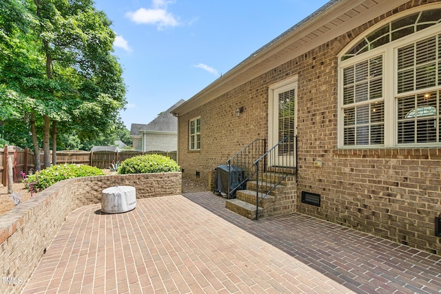 412 Whitt Ave, Burlington, NC 27215 - fenced backyard featuring a patio, entry steps, and grilling area