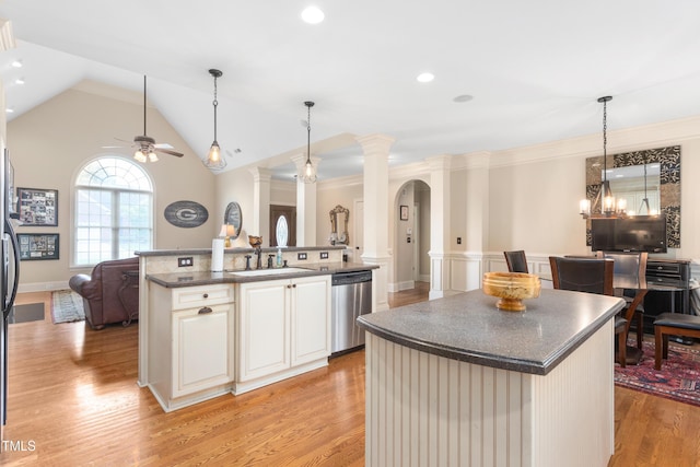 412 Whitt Ave, Burlington, NC 27215 - kitchen with a center island with sink, stainless steel dishwasher, open floor plan, ornate columns, and wainscoting