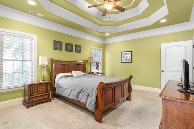 412 Whitt Ave, Burlington, NC 27215 - bedroom featuring crown molding, carpet floors, multiple windows, a tray ceiling, and ceiling fan