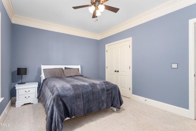 412 Whitt Ave, Burlington, NC 27215 - bedroom featuring crown molding, carpet floors, ceiling fan, and a closet
