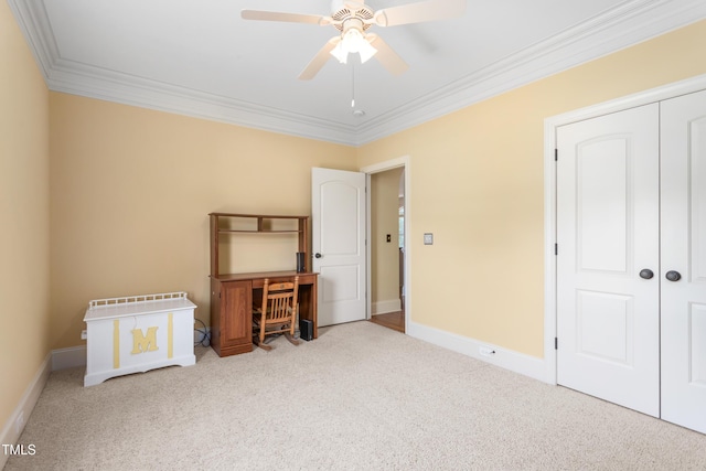 412 Whitt Ave, Burlington, NC 27215 - unfurnished bedroom with carpet, crown molding, a closet, and a ceiling fan