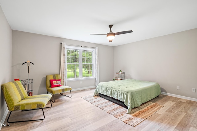 2809 Titleist Dr, Hillsborough, NC 27278 - bedroom with wood finished floors and a ceiling fan
