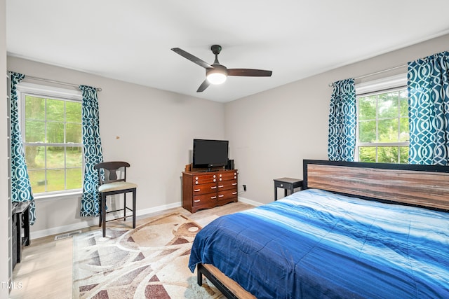 2809 Titleist Dr, Hillsborough, NC 27278 - bedroom featuring a ceiling fan and wood finished floors