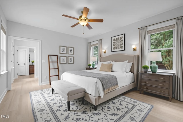 300 Oak Ridge Dr, Hillsborough, NC 27278 - bedroom featuring light wood-type flooring and a ceiling fan