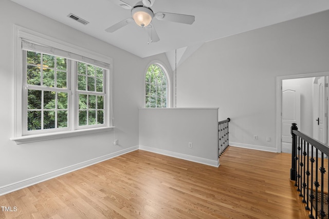 300 Oak Ridge Dr, Hillsborough, NC 27278 - unfurnished room featuring light wood-style flooring, vaulted ceiling, and ceiling fan