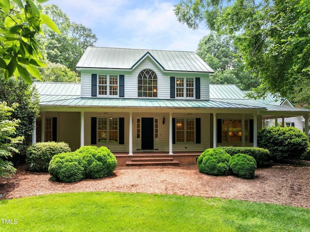 300 Oak Ridge Dr, Hillsborough, NC 27278 - view of front of property with a standing seam roof, a metal roof, and a porch