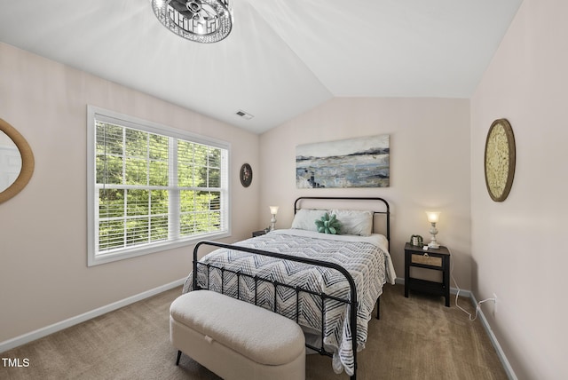 1625 Main Divide Dr, Wake Forest, NC 27587 - carpeted bedroom with baseboards and lofted ceiling