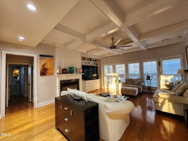 502 Willowmere Ct, Cary, NC 27513 - living room featuring ceiling fan, light wood-style floors, beam ceiling, a premium fireplace, and recessed lighting