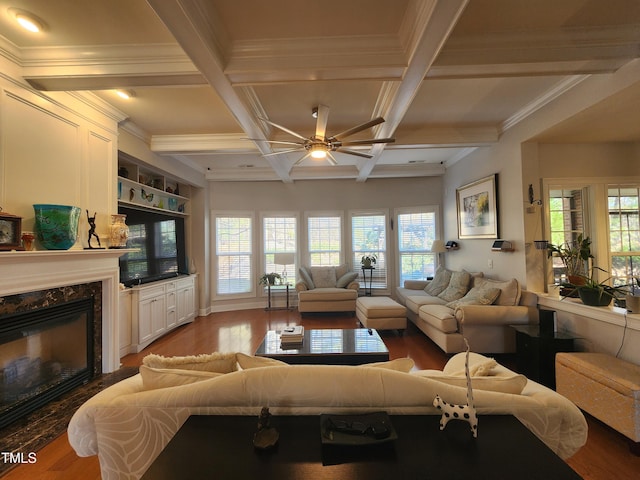 502 Willowmere Ct, Cary, NC 27513 - living room with ceiling fan, wood finished floors, coffered ceiling, a high end fireplace, and beam ceiling