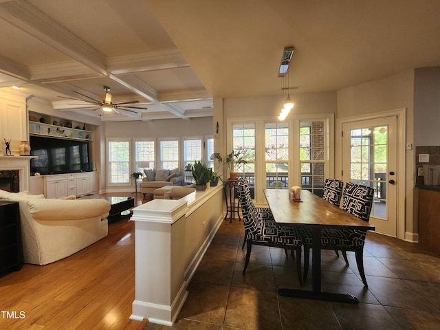 502 Willowmere Ct, Cary, NC 27513 - dining room featuring ceiling fan, beamed ceiling, coffered ceiling, and a premium fireplace