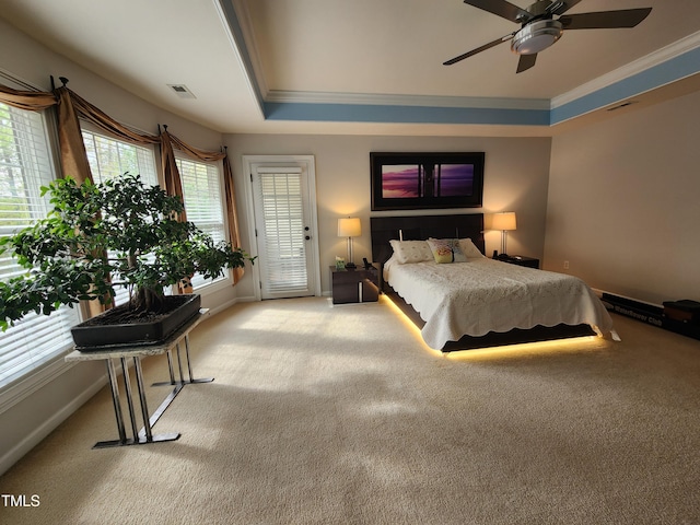 502 Willowmere Ct, Cary, NC 27513 - carpeted bedroom with crown molding, access to exterior, a raised ceiling, and a ceiling fan