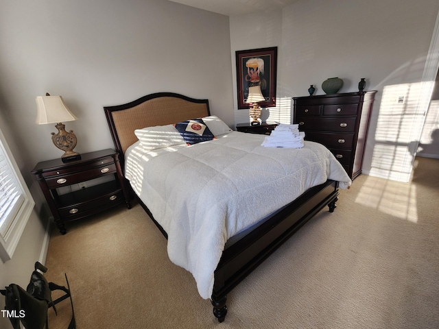 502 Willowmere Ct, Cary, NC 27513 - bedroom featuring light colored carpet and multiple windows