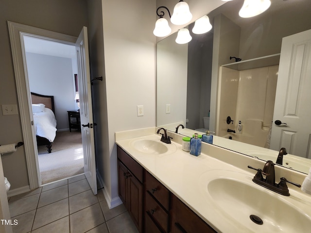 502 Willowmere Ct, Cary, NC 27513 - full bathroom featuring double vanity, tile patterned floors, and connected bathroom