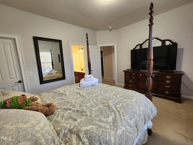 502 Willowmere Ct, Cary, NC 27513 - carpeted bedroom with baseboards and ensuite bath