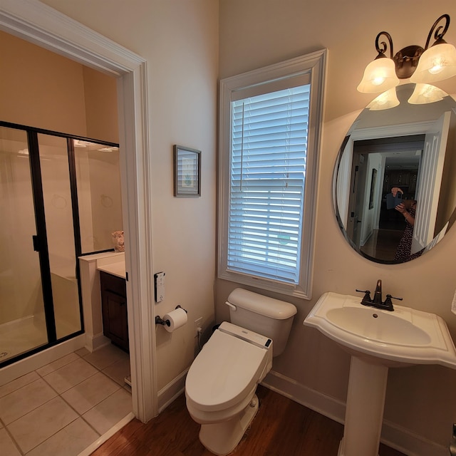 502 Willowmere Ct, Cary, NC 27513 - full bathroom with a shower stall and wood finished floors