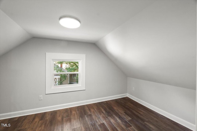 2617 Fayetteville St, Durham, NC 27707 - additional living space with dark wood-style floors and vaulted ceiling