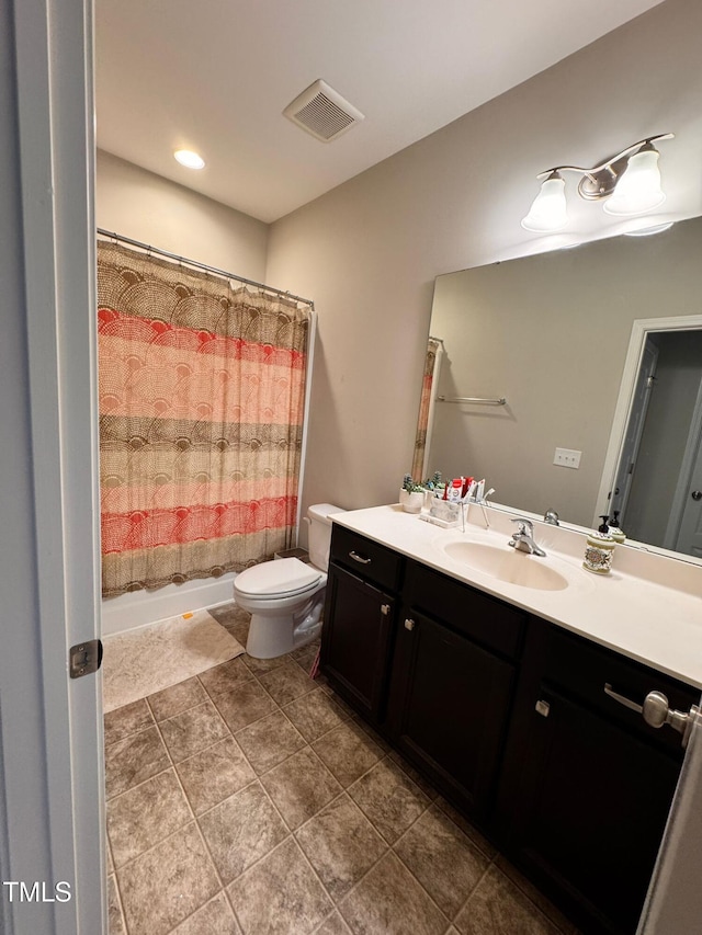 1005 Lathrop Ln, Apex, NC 27523 - full bathroom with vanity, tile patterned flooring, and shower / tub combo