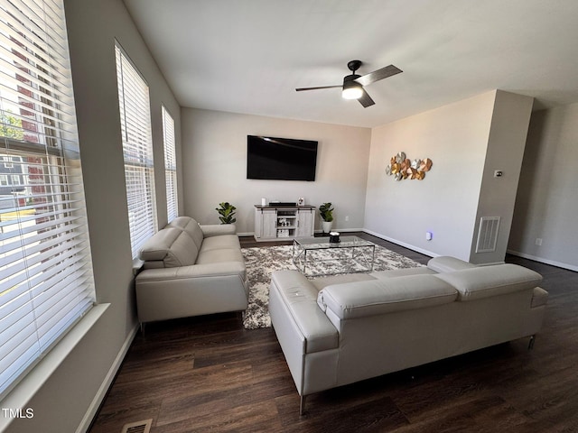 1005 Lathrop Ln, Apex, NC 27523 - living area featuring dark wood-type flooring and ceiling fan