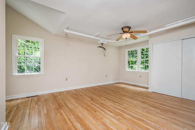 420 Lipscomb Grove Church Rd, Hillsborough, NC 27278 - unfurnished bedroom with light wood finished floors, ceiling fan, and a closet