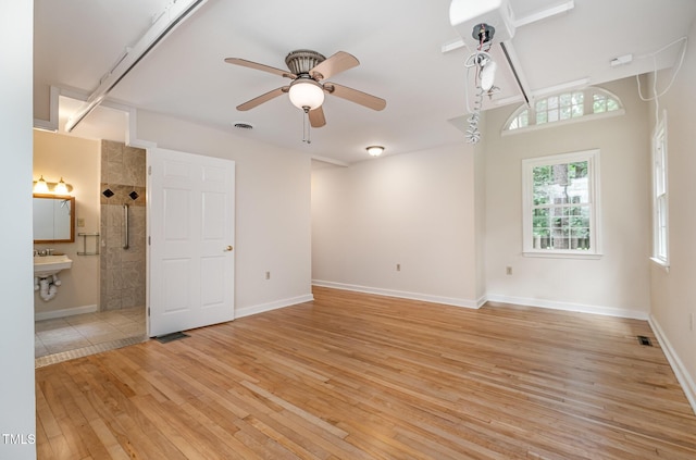 420 Lipscomb Grove Church Rd, Hillsborough, NC 27278 - empty room with light wood-style floors and ceiling fan