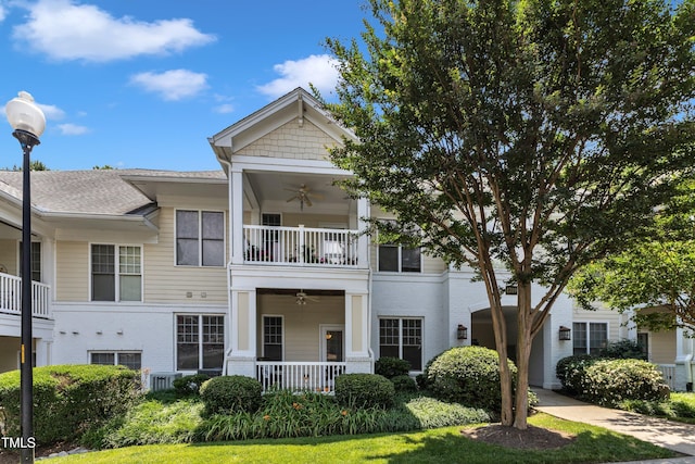 1310 Durlain Dr Unit 103, Raleigh, NC 27614 - multi unit property with ceiling fan, a balcony, brick siding, and a porch