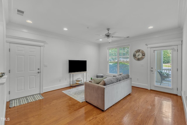 1310 Durlain Dr Unit 103, Raleigh, NC 27614 - living room featuring plenty of natural light, a ceiling fan, light wood-style floors, crown molding, and recessed lighting
