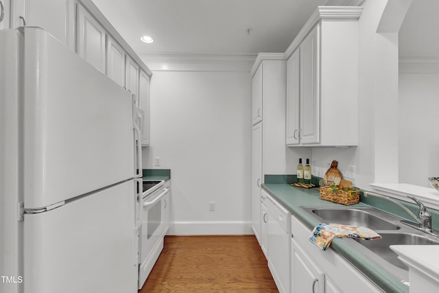 1310 Durlain Dr Unit 103, Raleigh, NC 27614 - kitchen with white appliances, recessed lighting, arched walkways, light wood-style floors, and crown molding