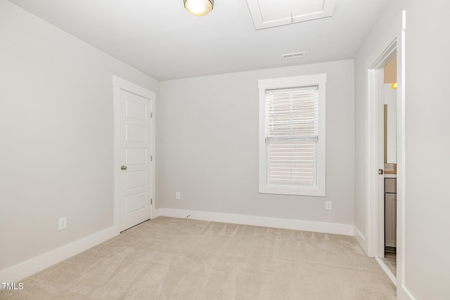 442 Granite Mill Blvd, Chapel Hill, NC 27516 - spare room featuring attic access and carpet flooring
