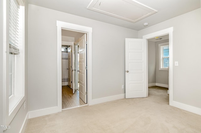 442 Granite Mill Blvd, Chapel Hill, NC 27516 - unfurnished bedroom with attic access and carpet flooring