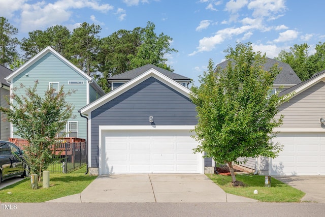 442 Granite Mill Blvd, Chapel Hill, NC 27516 - view of front of house with concrete driveway and an attached garage