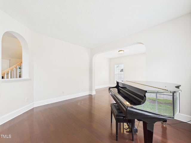 7501 Montibillo Pkwy, Durham, NC 27713 - sitting room with wood finished floors and arched walkways