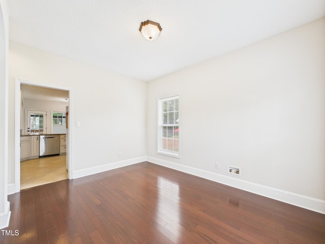 7501 Montibillo Pkwy, Durham, NC 27713 - spare room with dark wood-style floors and baseboards
