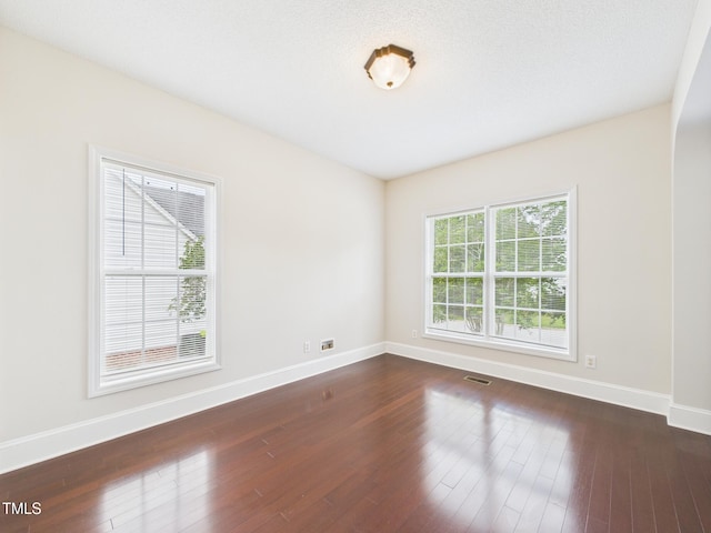 7501 Montibillo Pkwy, Durham, NC 27713 - empty room featuring dark wood-style flooring